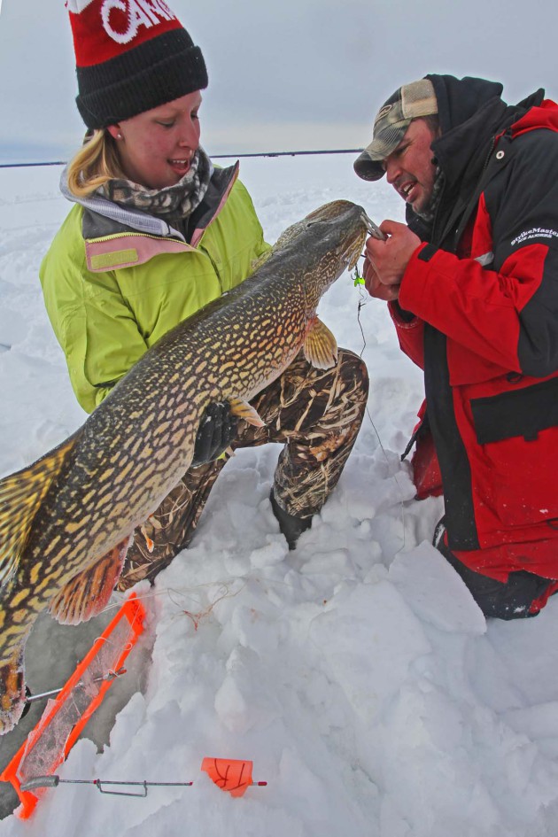 youth-with-northern-pike-fish